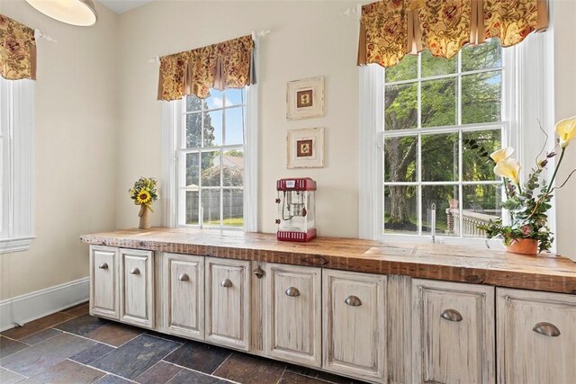 899 Old Thorn Run Rd, Moon/Crescent Twp, PA 15108 - interior space with dark stone finish floors and baseboards