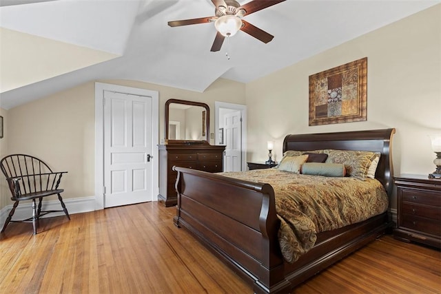 899 Old Thorn Run Rd, Moon/Crescent Twp, PA 15108 - bedroom with wood finished floors, vaulted ceiling, and a ceiling fan