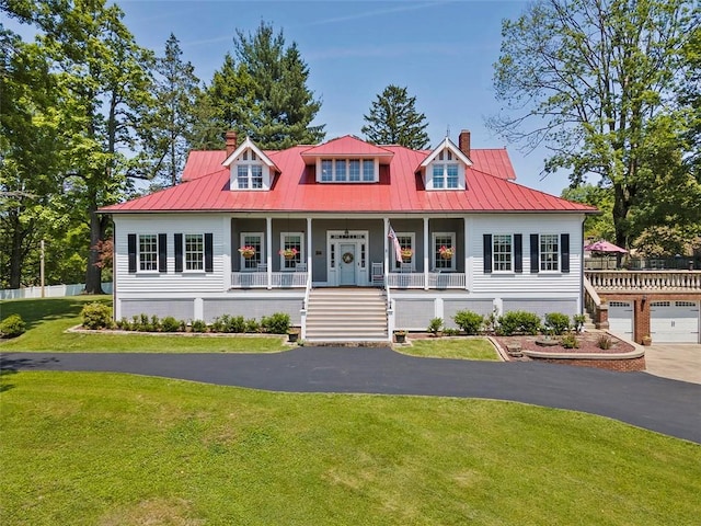 899 Old Thorn Run Rd, Moon/Crescent Twp, PA 15108 - cape cod home featuring a chimney, covered porch, a front yard, a metal roof, and stairs
