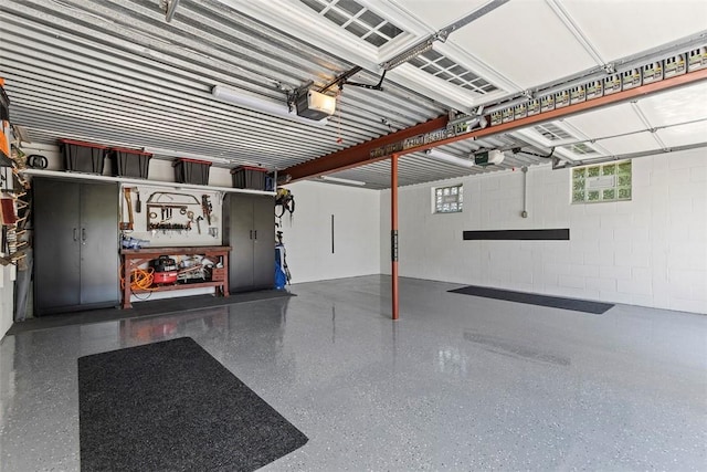 899 Old Thorn Run Rd, Moon/Crescent Twp, PA 15108 - garage featuring concrete block wall and a garage door opener