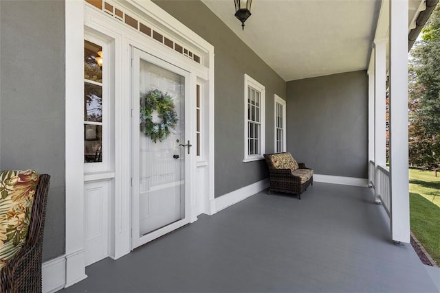 899 Old Thorn Run Rd, Moon/Crescent Twp, PA 15108 - doorway to property with covered porch and stucco siding