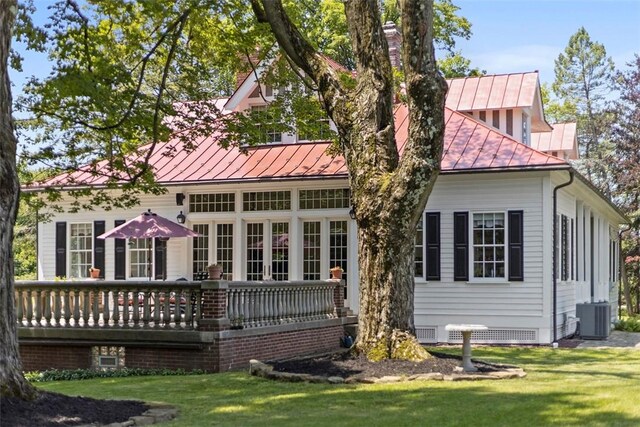 899 Old Thorn Run Rd, Moon/Crescent Twp, PA 15108 - back of property featuring a standing seam roof, a metal roof, and a yard
