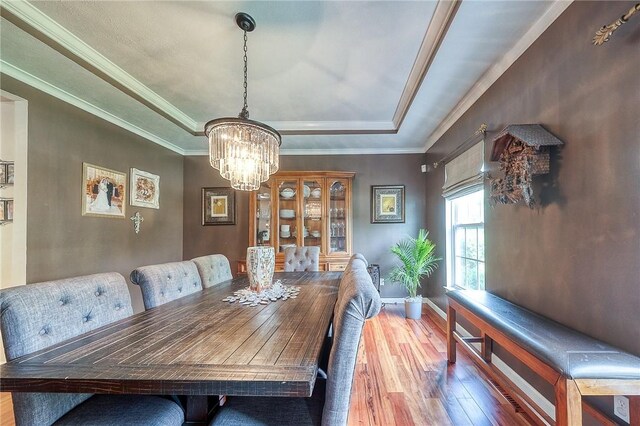 400 Chapel, Cranberry Twp, PA 16066 - dining room with a tray ceiling, wood-type flooring, a chandelier, and ornamental molding