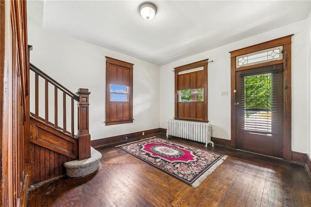 520 Morrell Ave, Connellsville, PA 15425 - foyer entrance featuring radiator heating unit, hardwood / wood-style flooring, and stairway