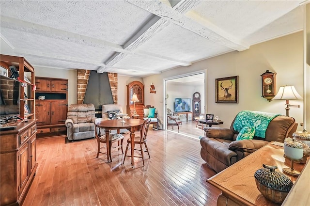 4735 Pine Cone Dr, Hermitage, PA 16148 - dining area with light wood-style flooring, beamed ceiling, a textured ceiling, and coffered ceiling
