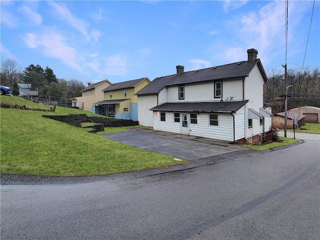 778 Millers Run Rd, Mcdonald Nwa, PA 15057 - view of front of home featuring a chimney and a front lawn