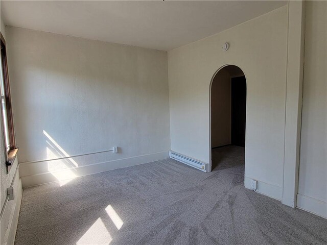 778 Millers Run Rd, Mcdonald Nwa, PA 15057 - carpeted spare room featuring baseboard heating, arched walkways, and a smoke detector