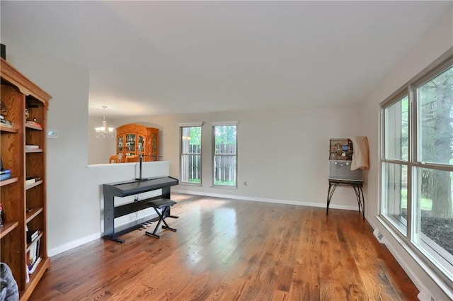 1259 Lakevue Dr, Penn Twp, PA 16001 - sitting room with a chandelier, healthy amount of natural light, and wood finished floors