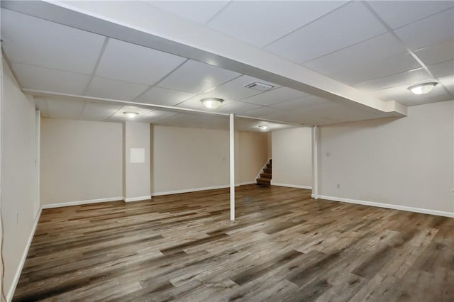 1259 Lakevue Dr, Penn Twp, PA 16001 - finished basement with a paneled ceiling, wood finished floors, and stairway