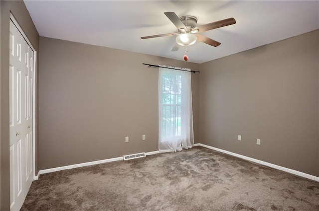 1259 Lakevue Dr, Penn Twp, PA 16001 - unfurnished bedroom featuring carpet floors, a closet, and a ceiling fan