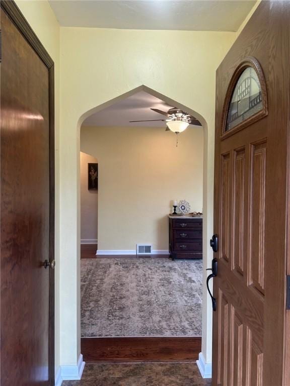 1006 Grandview Ave, Ross Twp, PA 15237 - foyer with arched walkways, dark wood-style floors, and ceiling fan