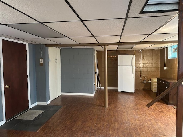 1006 Grandview Ave, Ross Twp, PA 15237 - below grade area featuring freestanding refrigerator, wood finished floors, and a drop ceiling