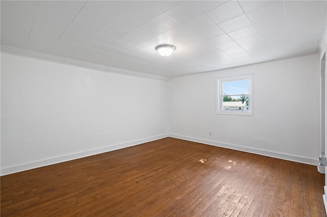 1723 Kimball Ave, Arnold, PA 15068 - empty room featuring dark wood-style floors and baseboards