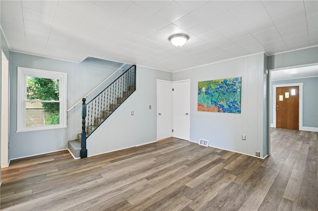 1723 Kimball Ave, Arnold, PA 15068 - unfurnished living room featuring wood finished floors and stairs