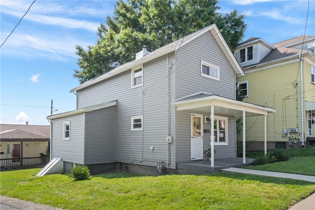 1723 Kimball Ave, Arnold, PA 15068 - view of front of home with a front lawn, a porch, and a chimney