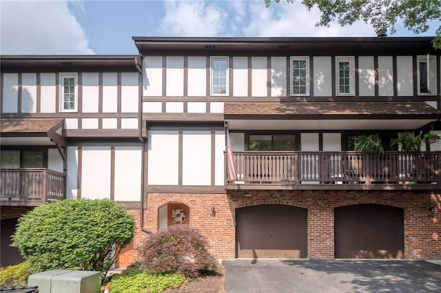 413 Allenberry Dr, Ross Twp, PA 15237 - view of building exterior with an attached garage and driveway