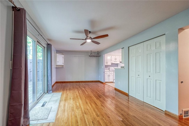 413 Allenberry Dr, Ross Twp, PA 15237 - unfurnished bedroom with light wood-type flooring, ceiling fan, and a closet