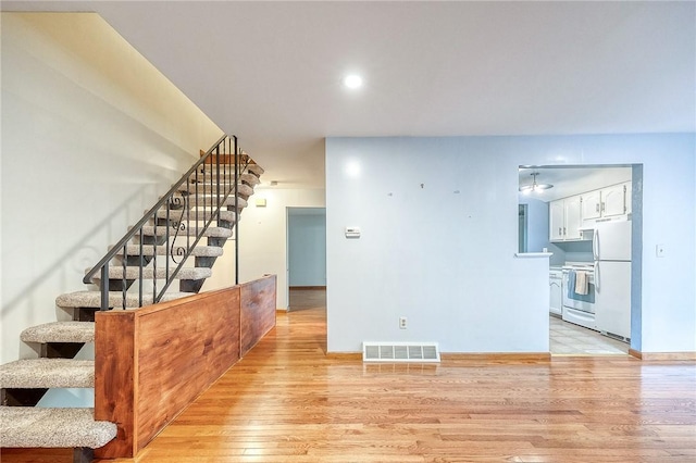 413 Allenberry Dr, Ross Twp, PA 15237 - stairway with wood finished floors and recessed lighting
