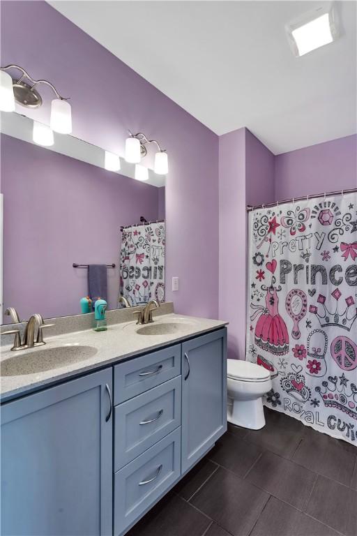 413 Cayuga Cir, Marshall, PA 16046 - bathroom with double vanity, tile patterned flooring, and curtained shower