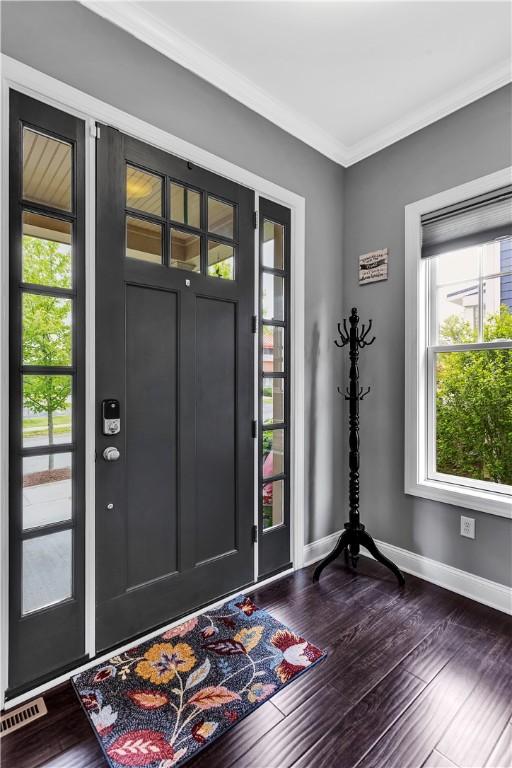 413 Cayuga Cir, Marshall, PA 16046 - foyer entrance featuring dark wood-style floors and ornamental molding