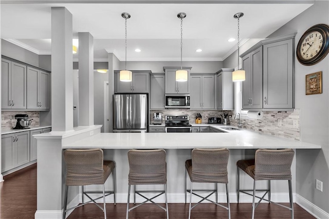 413 Cayuga Cir, Marshall, PA 16046 - kitchen featuring stainless steel appliances, gray cabinets, tasteful backsplash, a peninsula, and light countertops