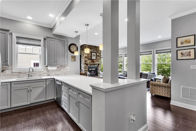 413 Cayuga Cir, Marshall, PA 16046 - kitchen with gray cabinets, a peninsula, crown molding, decorative backsplash, and stainless steel dishwasher