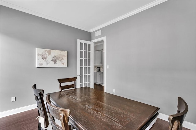 413 Cayuga Cir, Marshall, PA 16046 - dining space with french doors, dark wood-type flooring, and crown molding