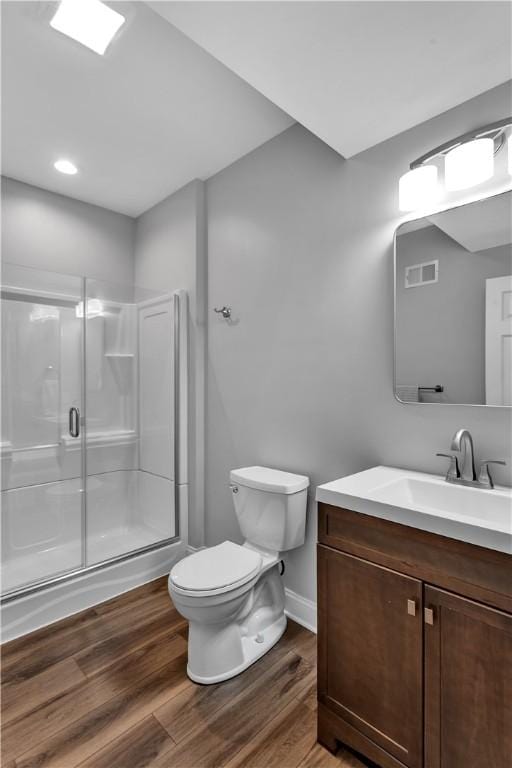 413 Cayuga Cir, Marshall, PA 16046 - bathroom featuring vanity, wood finished floors, and a stall shower