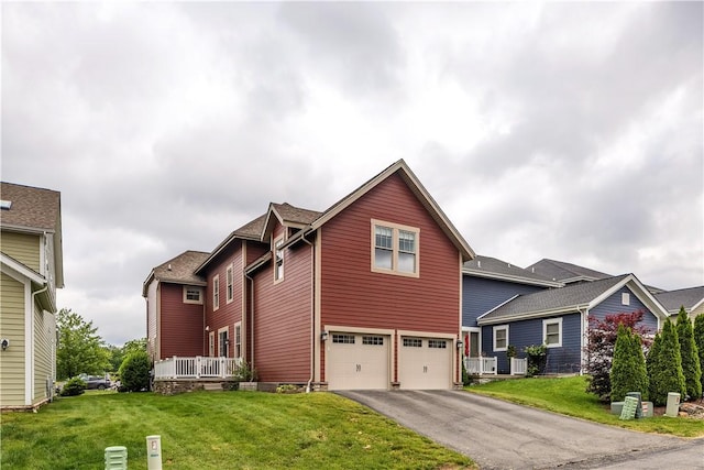 413 Cayuga Cir, Marshall, PA 16046 - traditional-style house with an attached garage, a front yard, and asphalt driveway