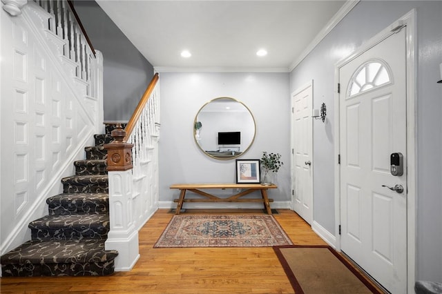 215 Emerson St, Shadyside, PA 15206 - foyer featuring stairway, wood finished floors, recessed lighting, and ornamental molding