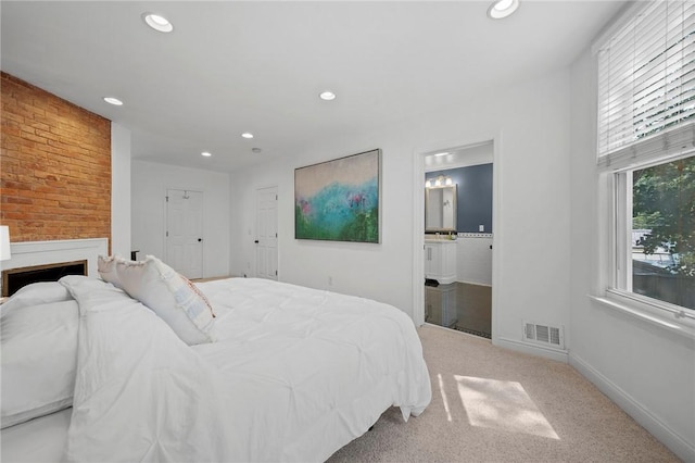 215 Emerson St, Shadyside, PA 15206 - bedroom with recessed lighting, carpet, ensuite bath, and a fireplace