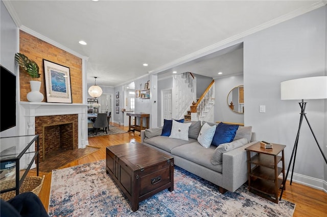 215 Emerson St, Shadyside, PA 15206 - living area with ornamental molding, stairs, wood finished floors, and recessed lighting