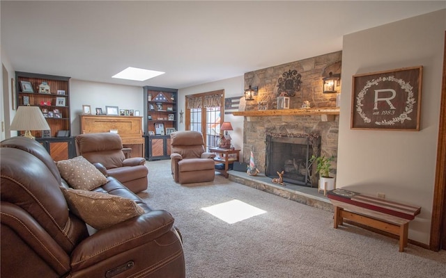 32 Dunham Dr, Hempfield Twp Wml, PA 15601 - living room featuring a stone fireplace, carpet floors, and a skylight