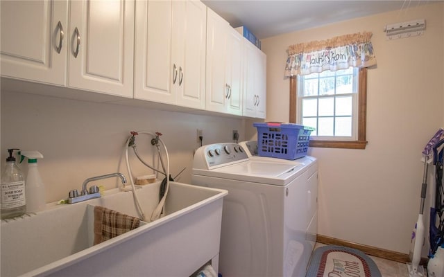 32 Dunham Dr, Hempfield Twp Wml, PA 15601 - laundry area featuring cabinet space and washing machine and dryer