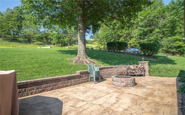 32 Dunham Dr, Hempfield Twp Wml, PA 15601 - view of patio / terrace with an outdoor fire pit