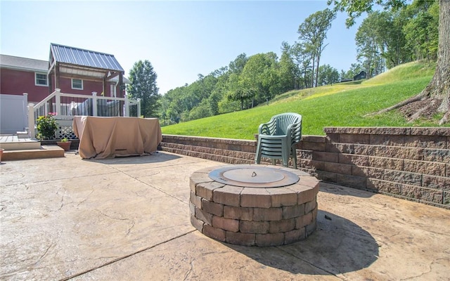 32 Dunham Dr, Hempfield Twp Wml, PA 15601 - view of patio / terrace with a fire pit and a wooden deck