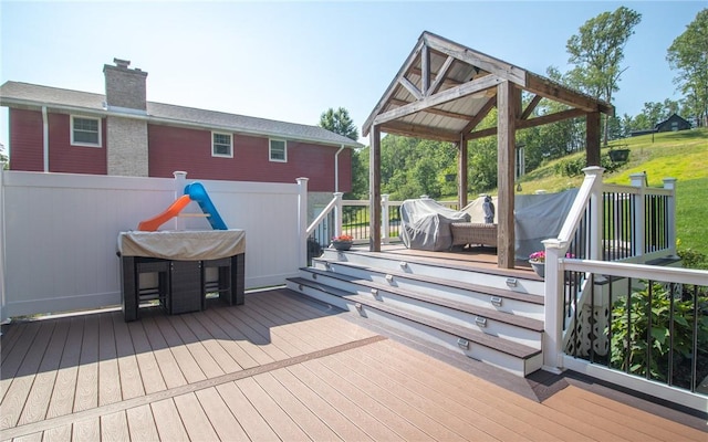 32 Dunham Dr, Hempfield Twp Wml, PA 15601 - wooden deck with a gazebo and area for grilling