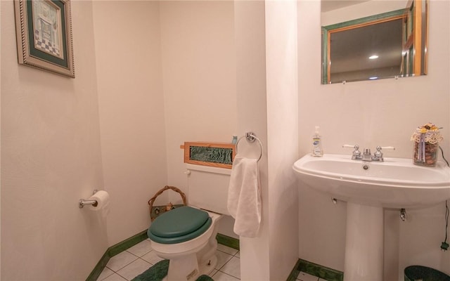 32 Dunham Dr, Hempfield Twp Wml, PA 15601 - bathroom with toilet and tile patterned floors