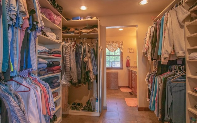 32 Dunham Dr, Hempfield Twp Wml, PA 15601 - walk in closet featuring tile patterned floors
