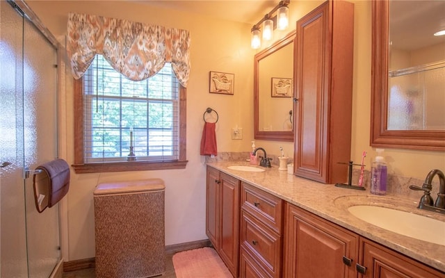32 Dunham Dr, Hempfield Twp Wml, PA 15601 - full bathroom featuring plenty of natural light, double vanity, and a shower with door