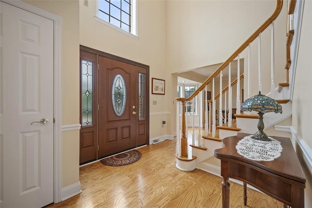 110 Northgate, West Mifflin, PA 15122 - entryway featuring a high ceiling, wood finished floors, and stairway