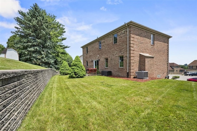 110 Northgate, West Mifflin, PA 15122 - view of property exterior featuring brick siding and a lawn