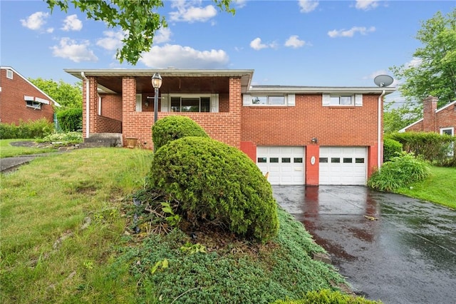 23 Corbett Ave, Hempfield Twp Wml, PA 15642 - single story home with driveway, an attached garage, a front lawn, and brick siding