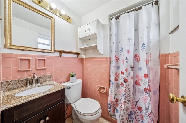 23 Corbett Ave, Hempfield Twp Wml, PA 15642 - full bathroom featuring tile walls, vanity, curtained shower, and a wainscoted wall