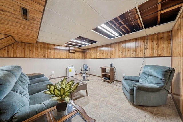 23 Corbett Ave, Hempfield Twp Wml, PA 15642 - living room with wooden walls and lofted ceiling