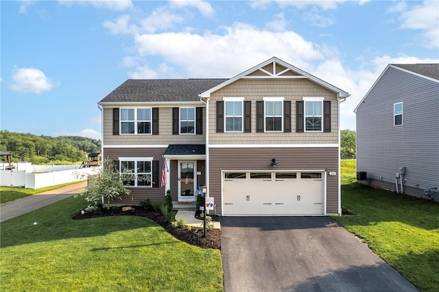 226 Stevens Ct, South Strabane, PA 15301 - view of front of home featuring asphalt driveway and a garage