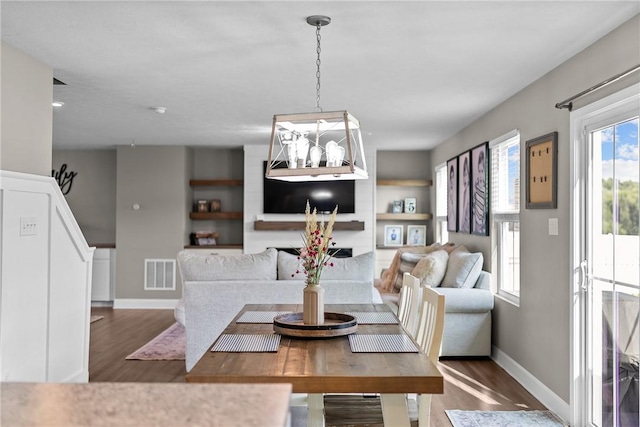 226 Stevens Ct, South Strabane, PA 15301 - dining area with wood finished floors and baseboards