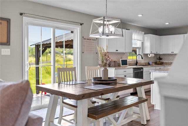 226 Stevens Ct, South Strabane, PA 15301 - dining area featuring healthy amount of natural light, a chandelier, wood finished floors, and recessed lighting