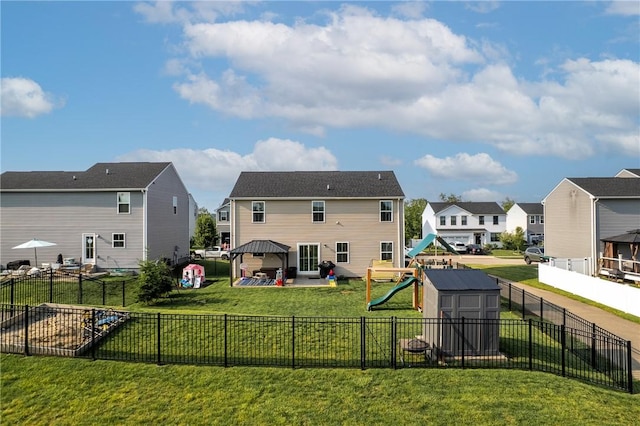 226 Stevens Ct, South Strabane, PA 15301 - rear view of property featuring a playground, a residential view, a gazebo, and a fenced backyard