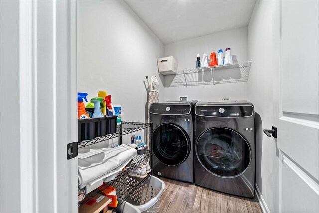 226 Stevens Ct, South Strabane, PA 15301 - washroom with washing machine and dryer and wood finished floors